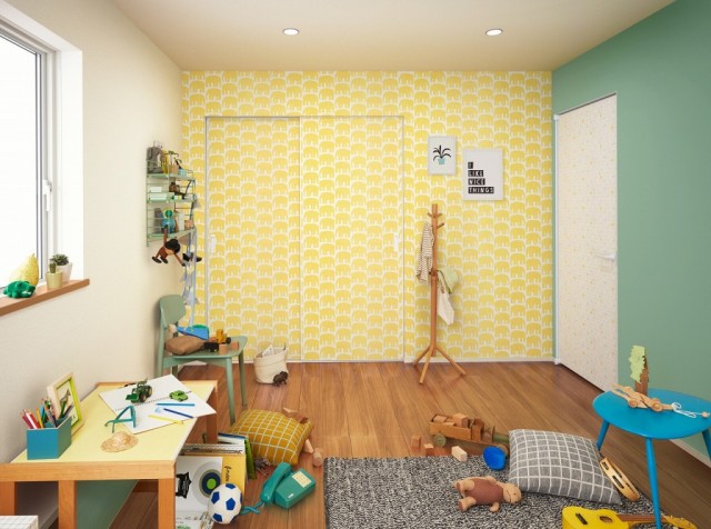 さまざまなパターンの壁紙を貼り分けた子ども部屋施工例。写真右手が「ファミット」片開きドア、正面が同クローゼットドア。